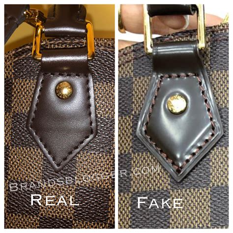 how to spot a fake alma louis vuitton bag